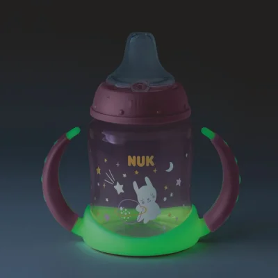 NUK boca za učiti piti, svijetli u mraku, 150 ml, roza